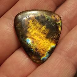 guitar pick carved from labradorite