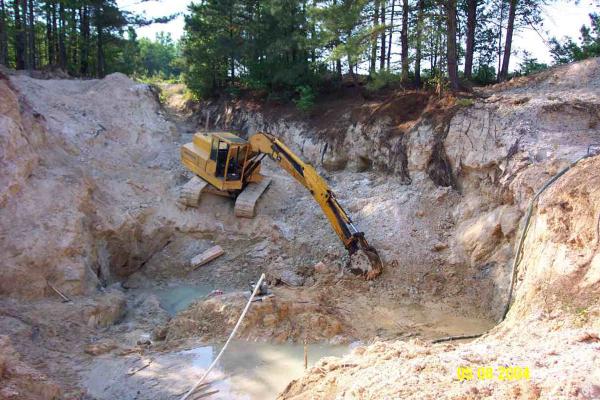 Ivey farm mine photo. note the two pumps high and low.